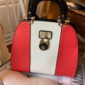 Black, white, and red purse
